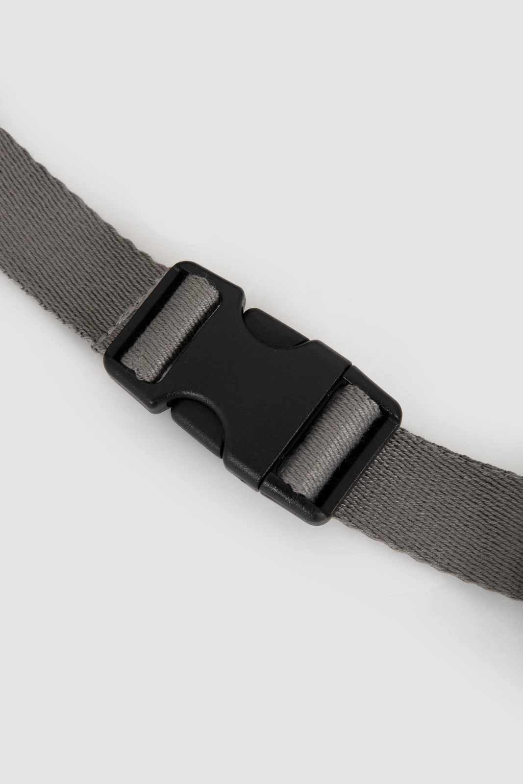 Close-up of grey adjustment buckle