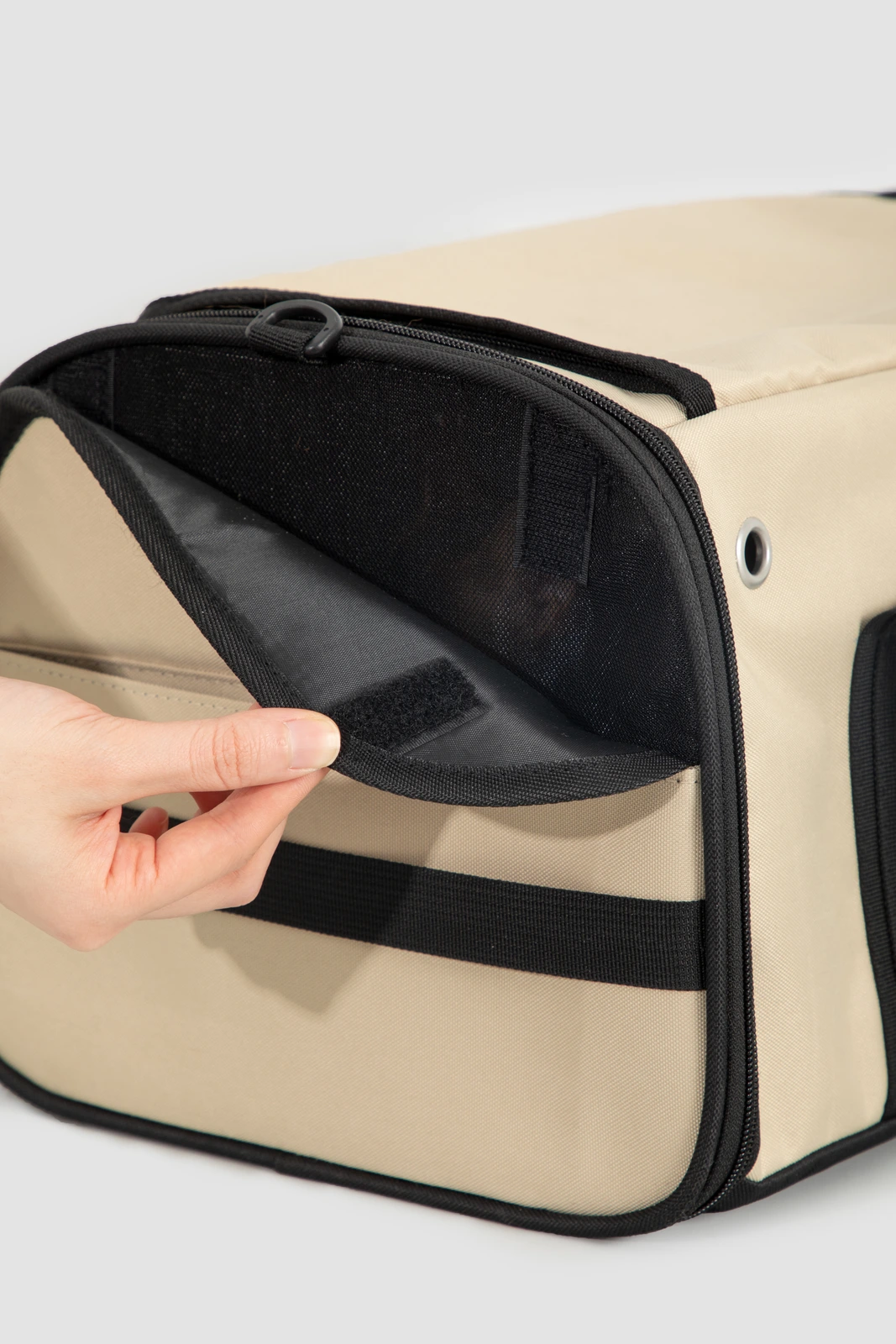 Side mesh panel and fabric cover opened for inspection