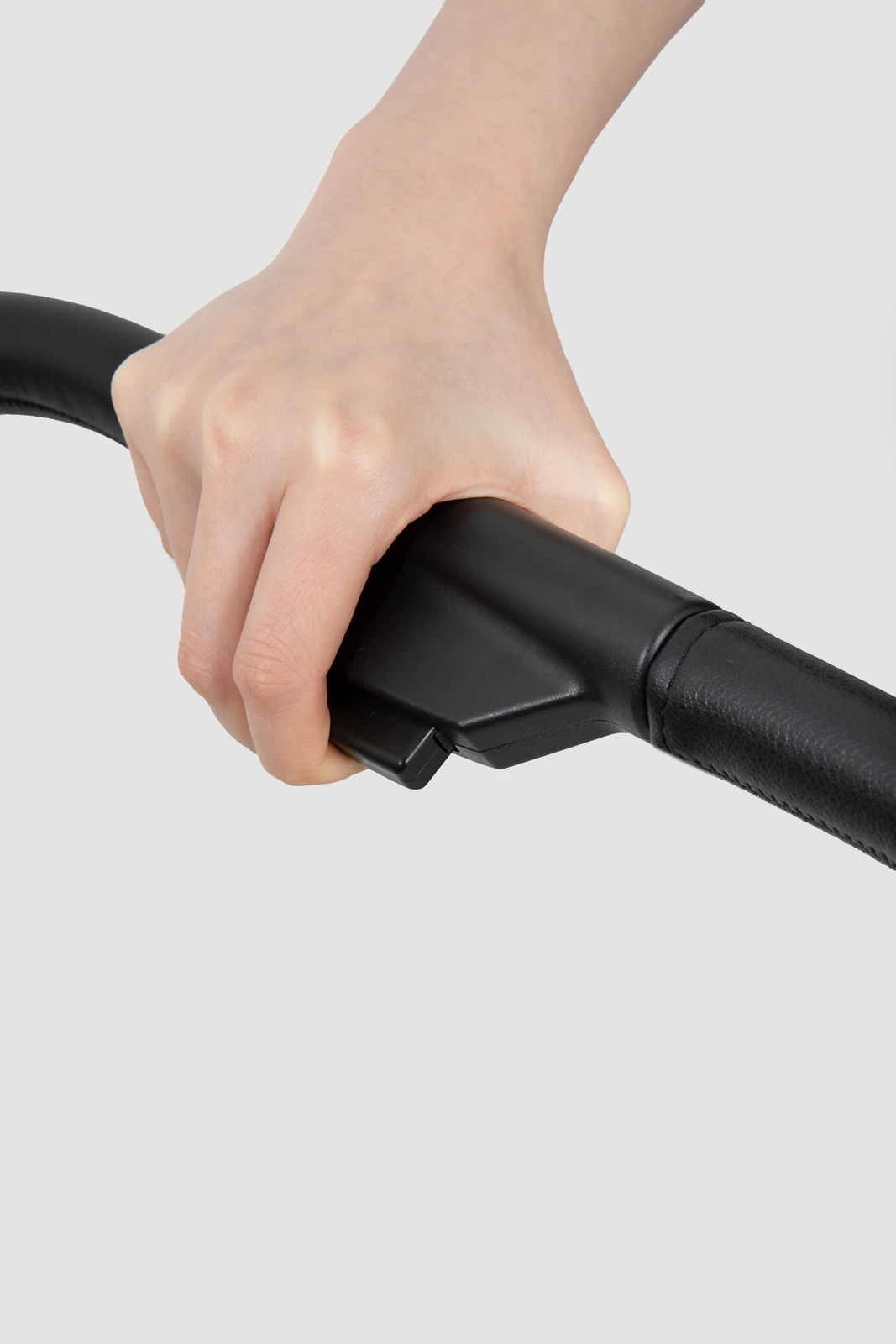 Close-up of the handle-mounted folding control