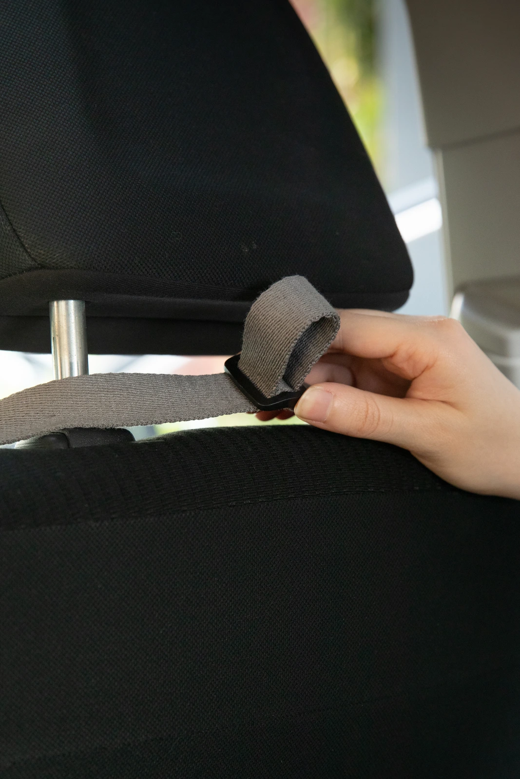 Close-up of headrest webbing attachment