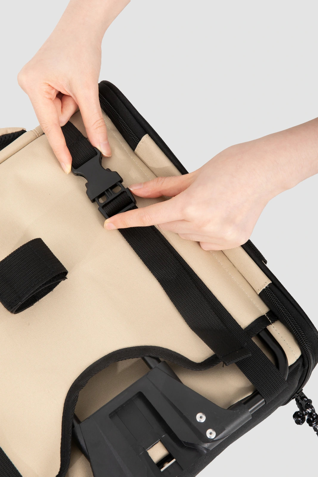 Close-up of rear webbing adjustment and buckle