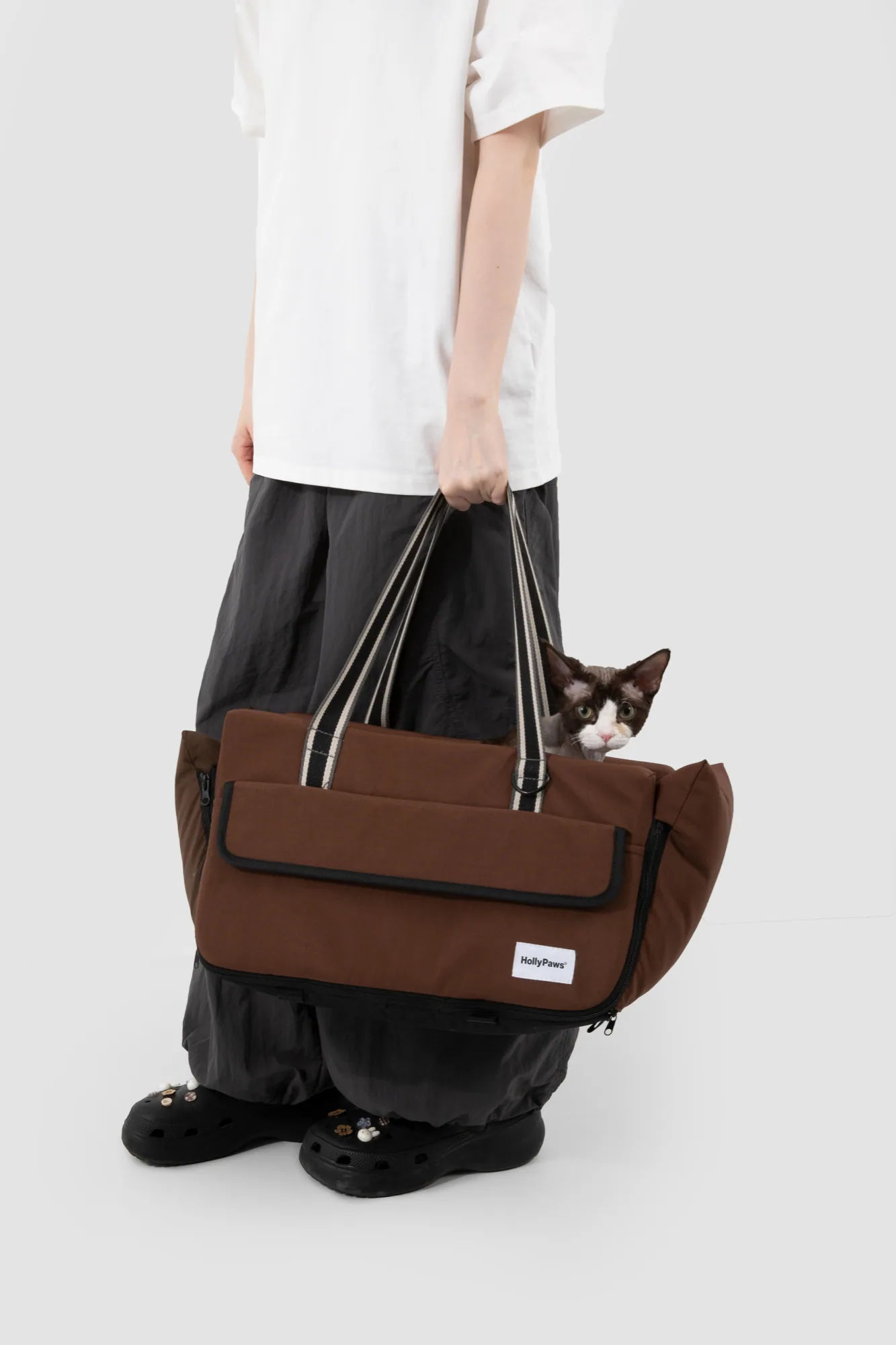 Nut Brown carrier shown with integrated hand-carry handles