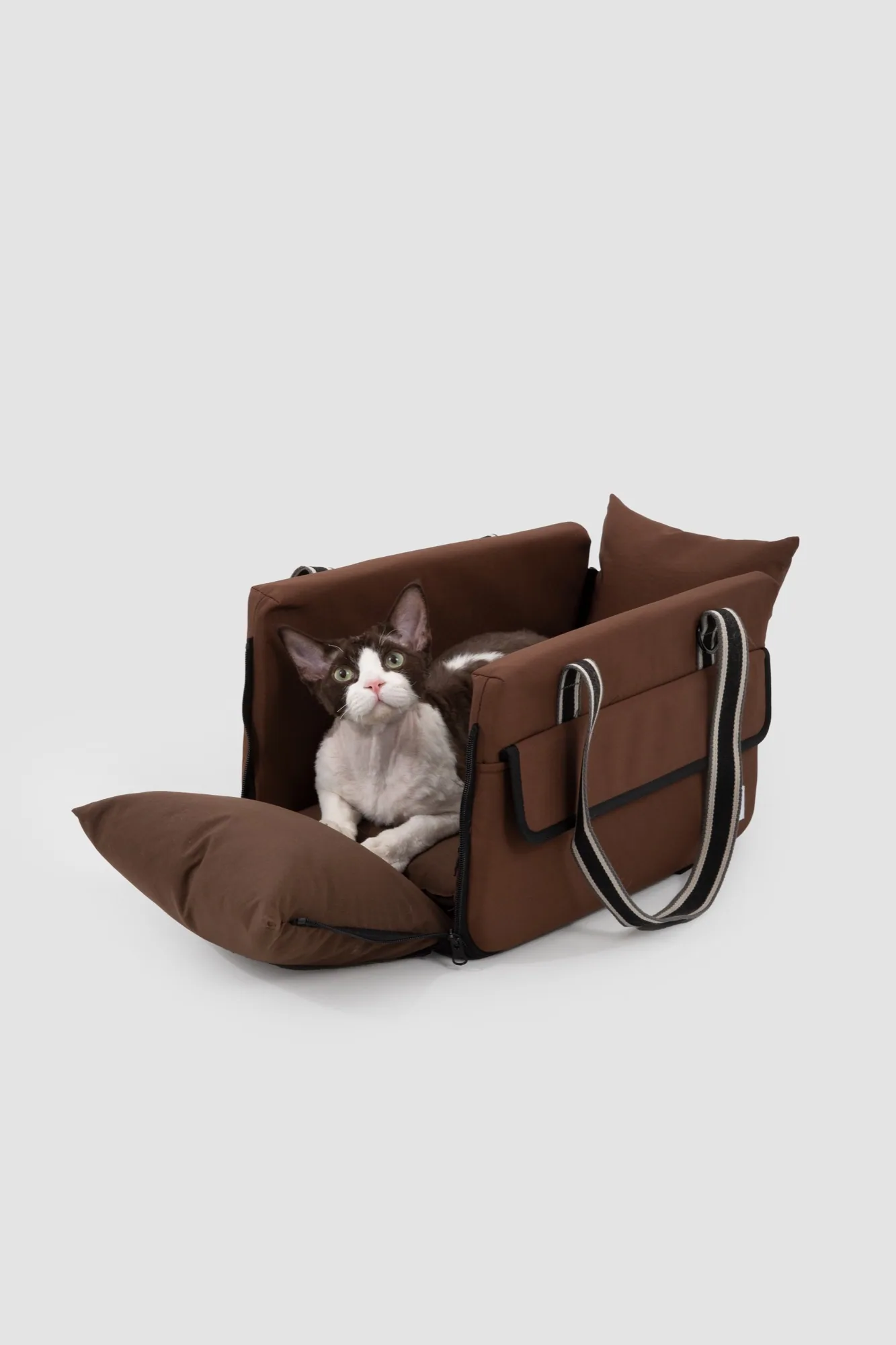 Nut Brown carrier opened at the side with a cat inside
