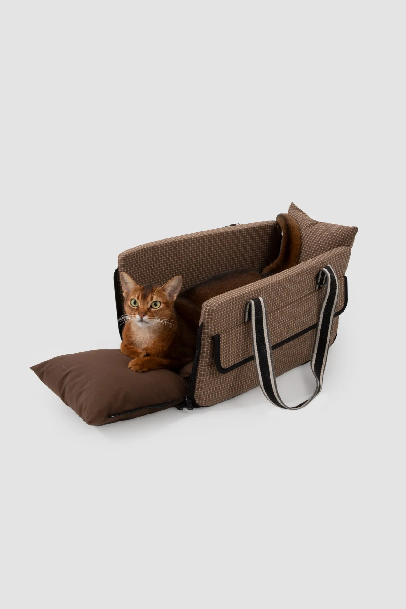 Brown Check carrier used as an open padded bed