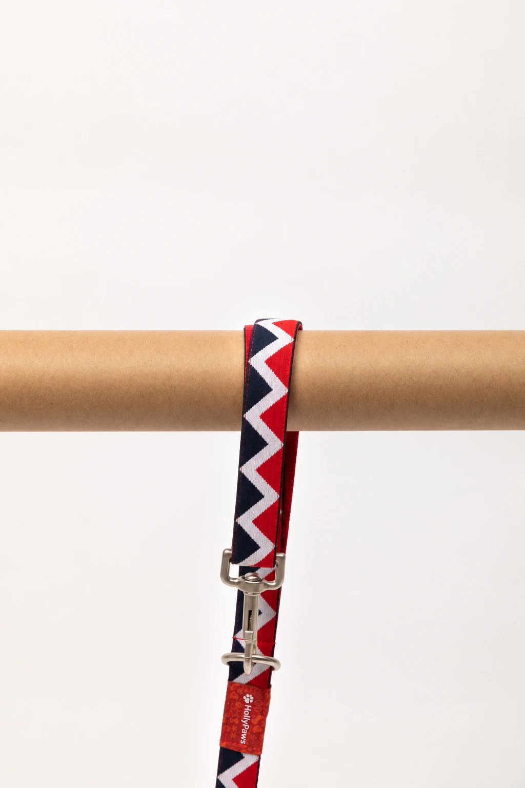 Close-up of leash snap, webbing and HollyPaws woven label