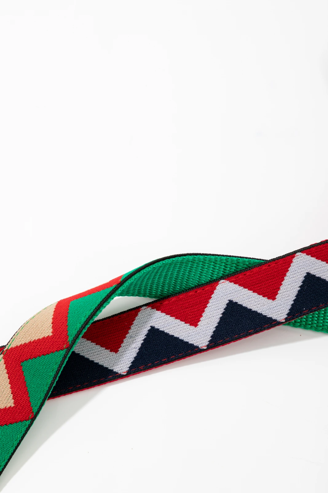 Close-up of geometric collar webbing weave and bound edges